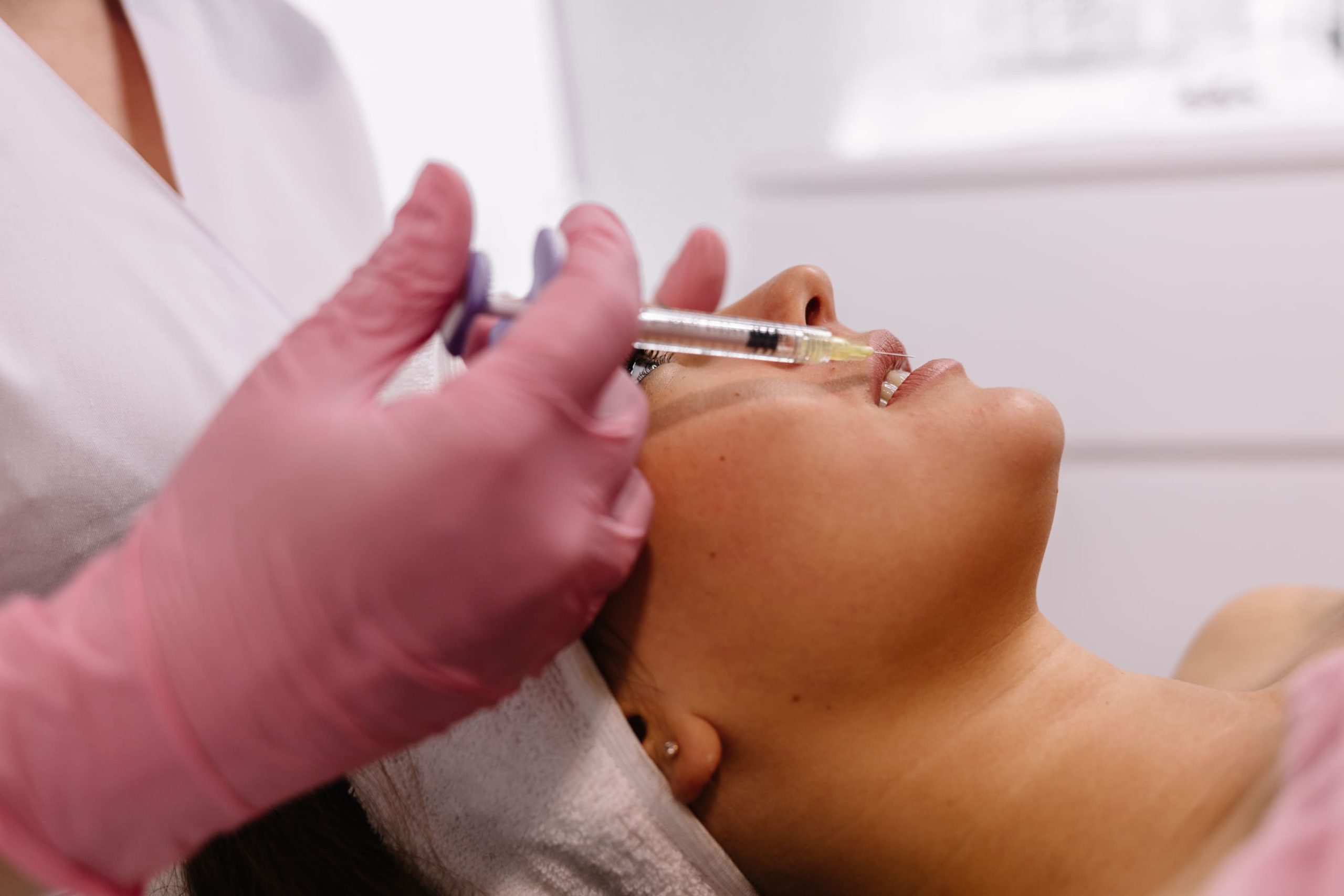 doctor-in-gloves-giving-woman-botox-injections-in-2025-03-13-05-41-14-utc
